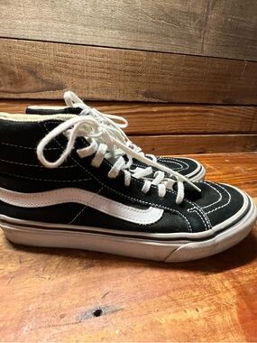 Vans Black and White High Top Sneakers
